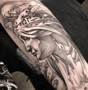 Tattoo of Alphonse Mucha's art 1